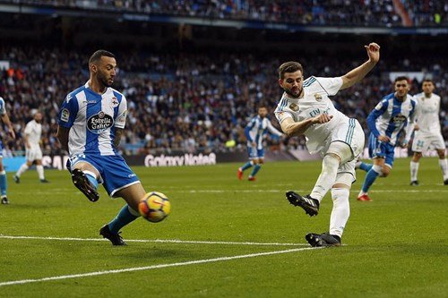 Nacho xoay người sút bóng tinh tế ấn định chiến thắng tưng bừng 7-1 cho Real ở phút 88. Ảnh: Dailymail
