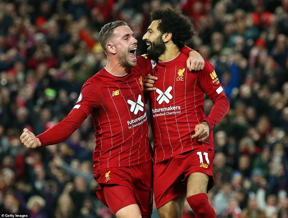 Henderson và Salah lập công giúp Liverpool lội ngược dòng đánh bại Tottenham với tỷ số 2-1. Ảnh: Getty