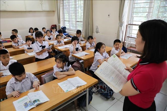 Giờ học của học sinh Tiểu học. Ảnh minh họa: TTXVN