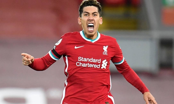 R.Firmino sung sướng tột độ sau bàn thắng ấn định chiến thắng 2-1 cho Liverpool trước Tottenham.Ảnh: GOAL.
